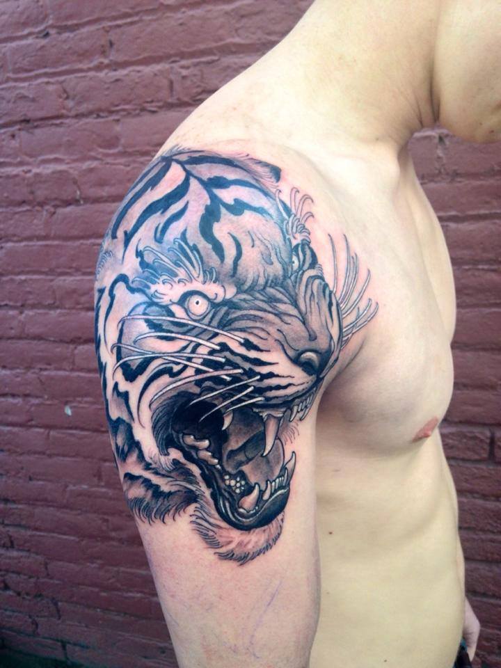Black And Grey Tiger Head Tattoo On Man Right Shoulder By Jeff Norton
