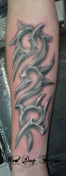 Black And Grey Tribal Design Tattoo On Forearm