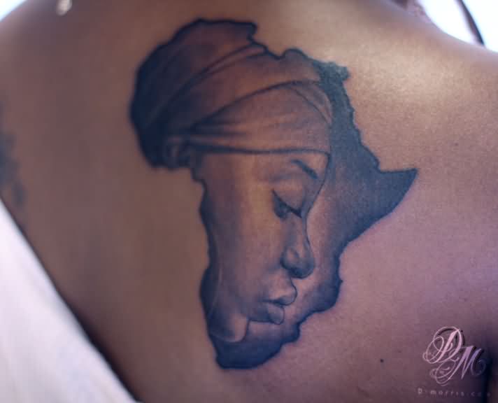 Black And Grey Women Face In Africa Map Tattoo Design For Upper Back