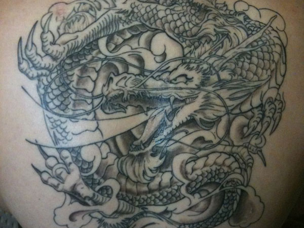 Black And Red Japanese Dragon Tattoo On Full Back