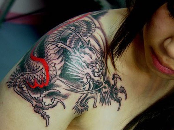 Black And Red Japanese Dragon Tattoo On Women Right Shoulder