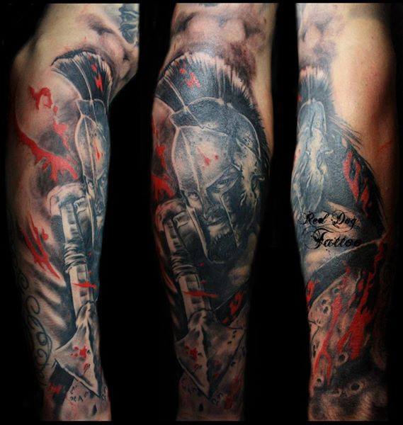 Black And Red Warrior Tattoo On Right Arm