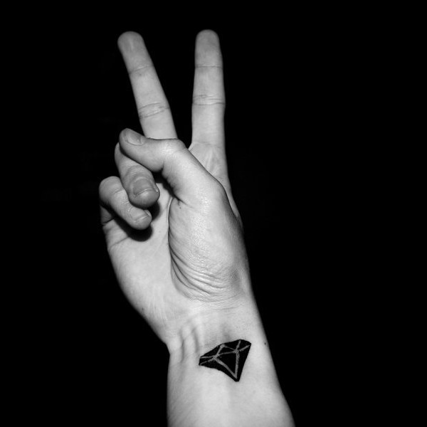 Black Diamond Tattoo On Right Wrist