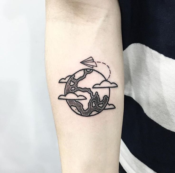 Black Globe With Paper Airplane Tattoo On Right Forearm By Sarita9999