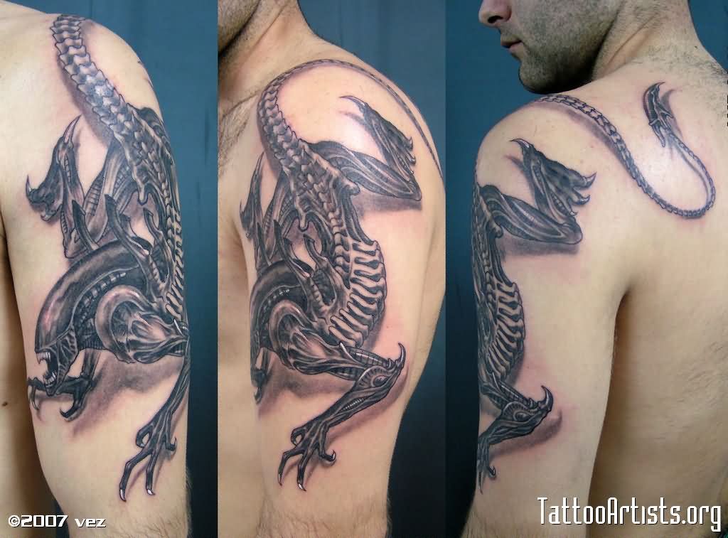 Black Ink 3D Alien Tattoo On Man Left Shoulder