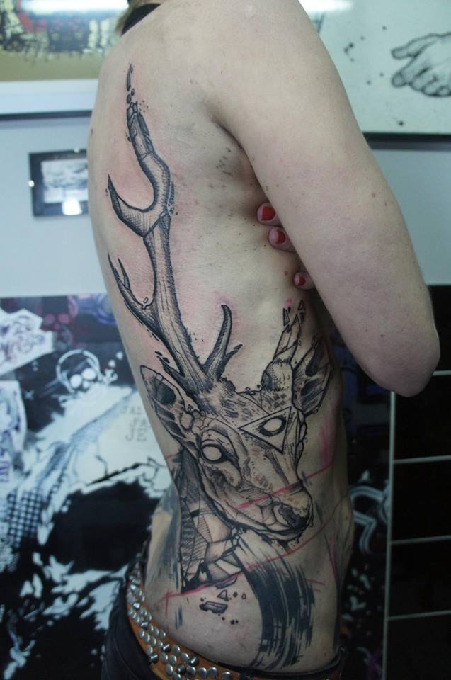 Black Ink Abstract Deer Head Tattoo On Women Right Side Rib