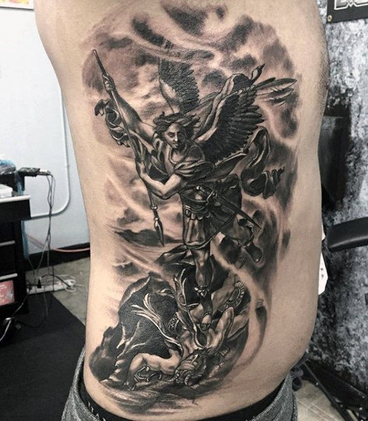 Black Ink Archangel Michael Tattoo On Man Right Side Rib