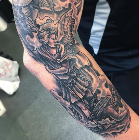 Black Ink Archangel Michael Tattoo On Right Arm By Chris