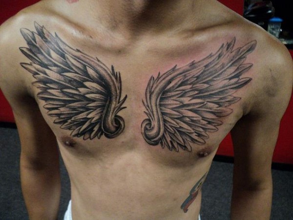 Black Ink Archangel Michael Wings Tattoo On Man Chest