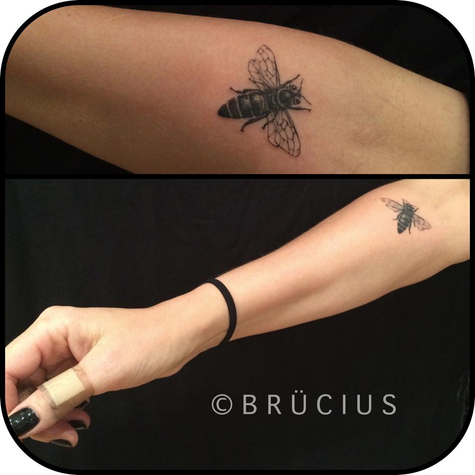 Black Ink Bee Tattoo On Right Forearm