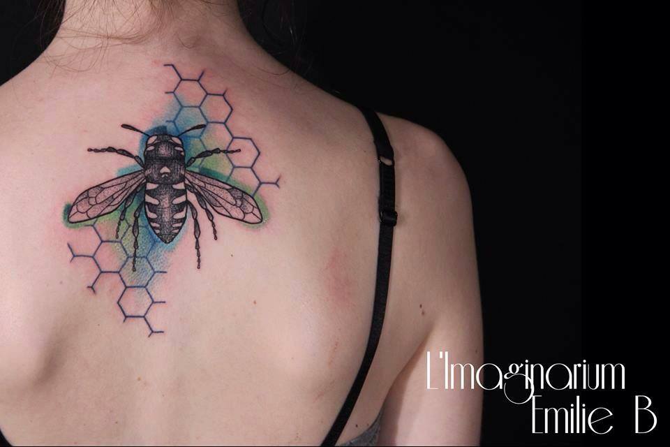 Black Ink Bee Tattoo On Women Upper Back by Emilie B