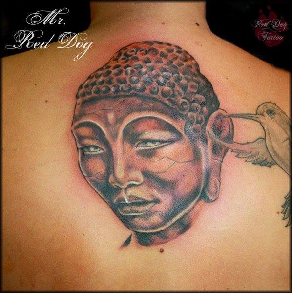 Black Ink Buddha Head Tattoo On Upper Back
