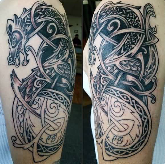 Black Ink Celtic Dragon Tattoo On Left Half Sleeve