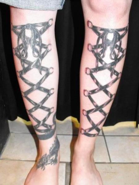 Black Ink Corset Tattoo On Both Leg