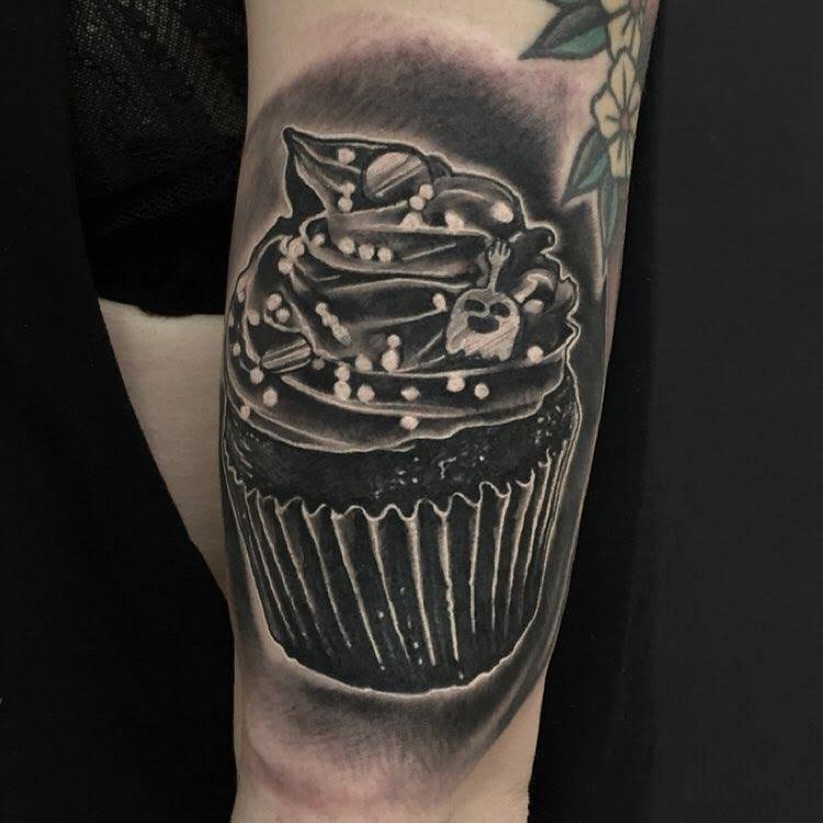 Black Ink Cupcake Tattoo Design For Sleeve