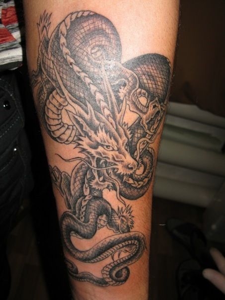 Black Ink Dragon Tattoo Design For Forearm