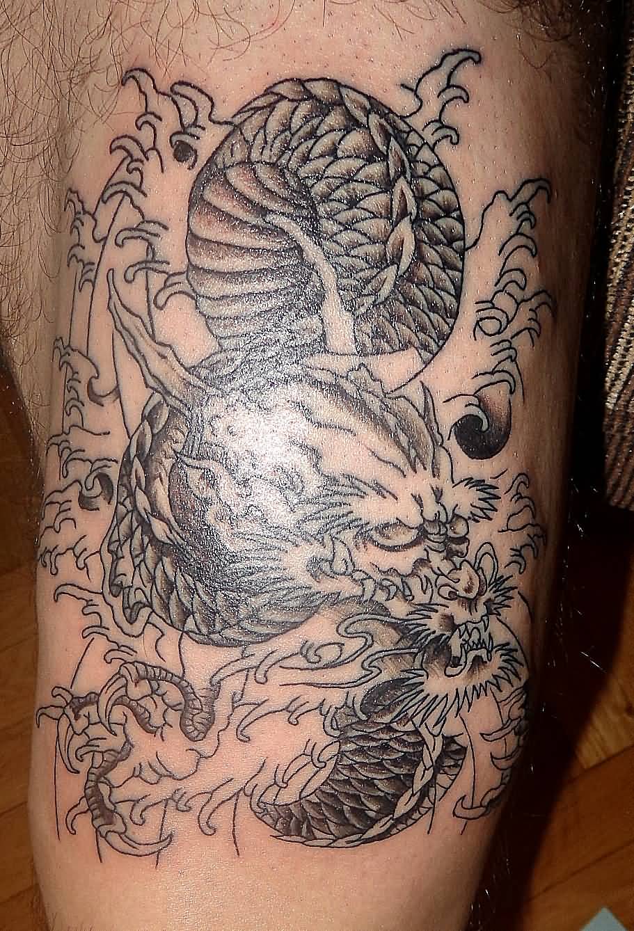 Black Ink Dragon Tattoo Design For Leg