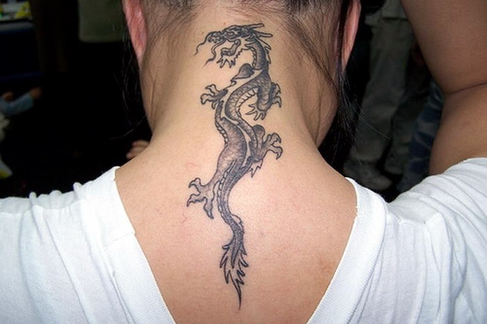 Black Ink Dragon Tattoo On Girl Back Neck