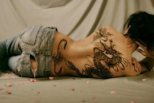 Black Ink Dragon Tattoo On Girl Full Back