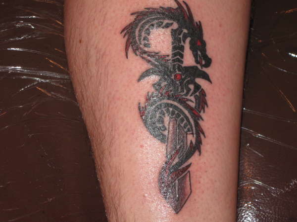 Black Ink Dragon Tattoo On Half Sleeve