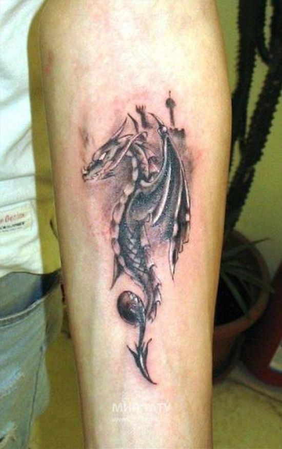 Black Ink Dragon Tattoo On Left Forearm