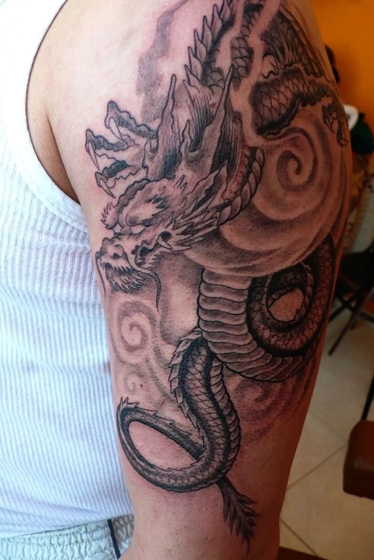 Black Ink Dragon Tattoo On Left Half Sleeve