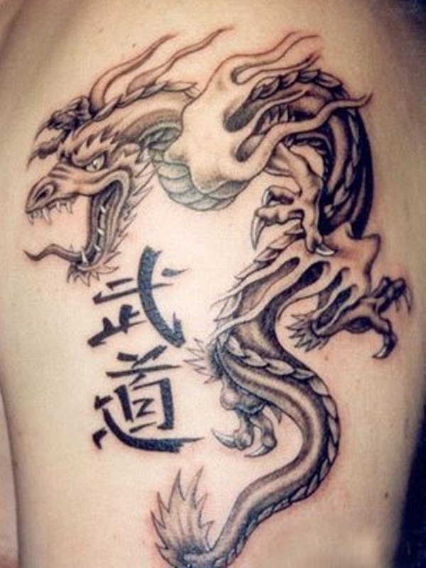 Black Ink Dragon Tattoo On Man Left Half Sleeve