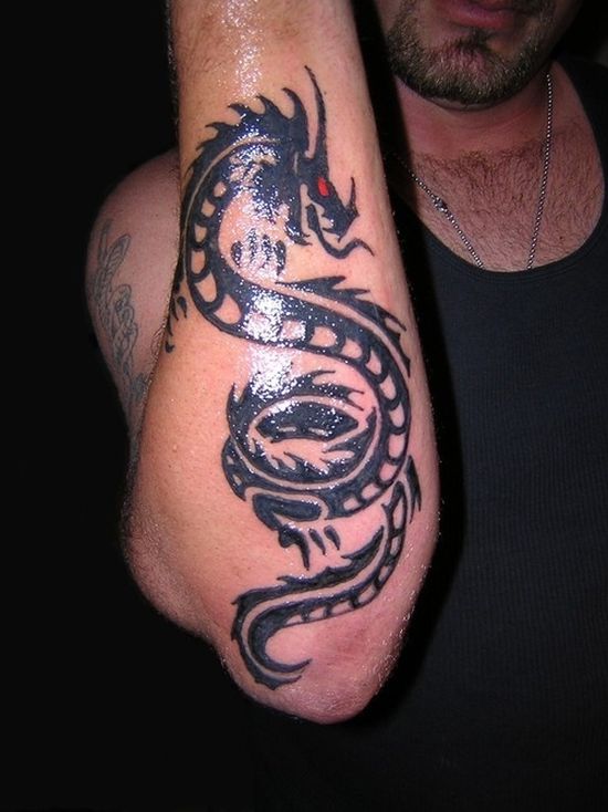 Black Ink Dragon Tattoo On Man Right Arm