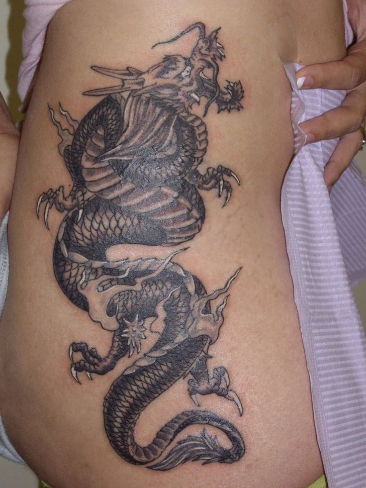 Black Ink Dragon Tattoo On Side Rib