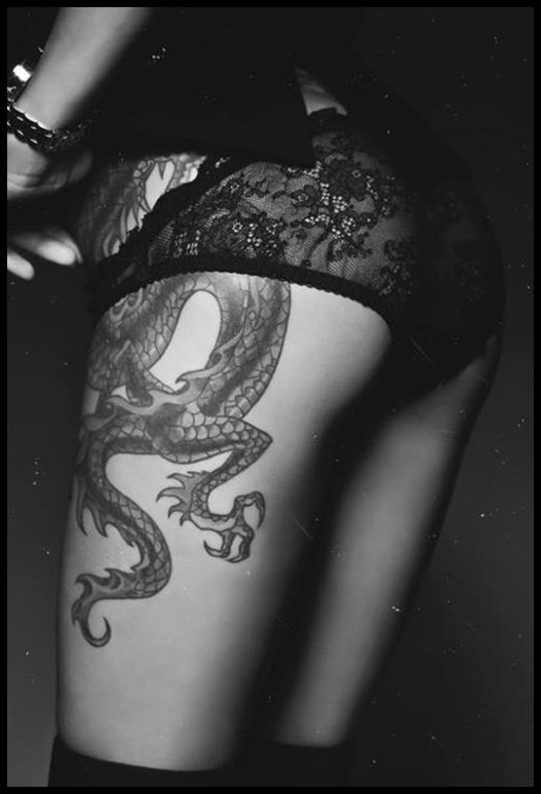 Black Ink Dragon Tattoo On Women Left Side Rib