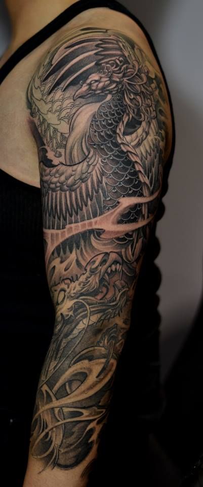 Black Ink Dragon With Bird Tattoo On Man Left Full Sleeve