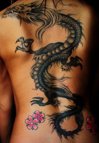 Black Ink Dragon With Flowers Tattoo On Full Back