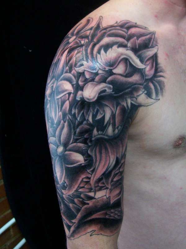 Black Ink Dragon With Flowers Tattoo On Right Half Sleeve