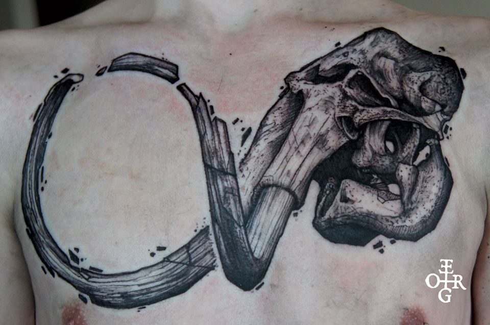 Black Ink Elephant Skull Tattoo On Man Chest by Ergo Nomik
