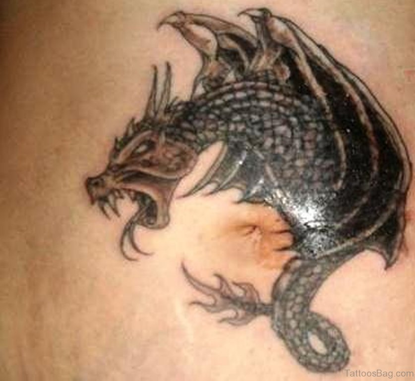 Black Ink Evil Dragon Tattoo On Man Stomach