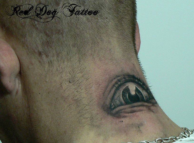 Black Ink Eye Tattoo On Man Back Neck