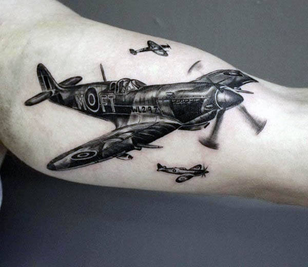 Black Ink Flying Airplanes Tattoo On Left Sleeve
