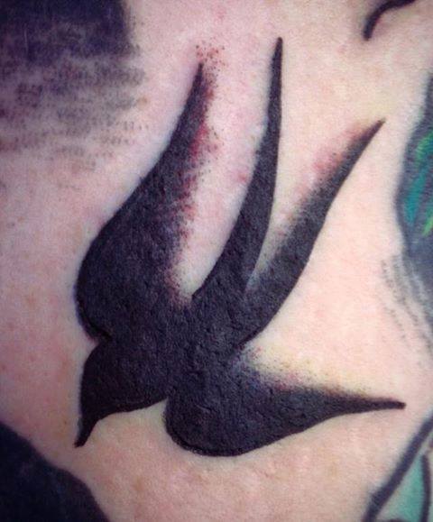 Black Ink Flying Bird Tattoo Design By Jay Thurley