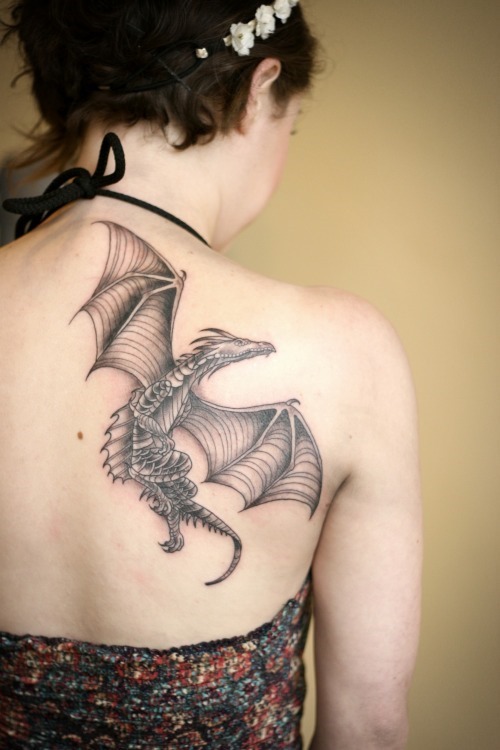 Black Ink Flying Dragon Tattoo On Women Right Back Shoulder