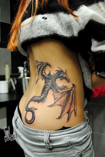 Black Ink Flying Dragon Tattoo On Women Right Side Rib By Nazo
