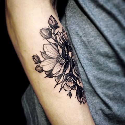 Black Ink Geranium Flowers Tattoo On Right Forearm