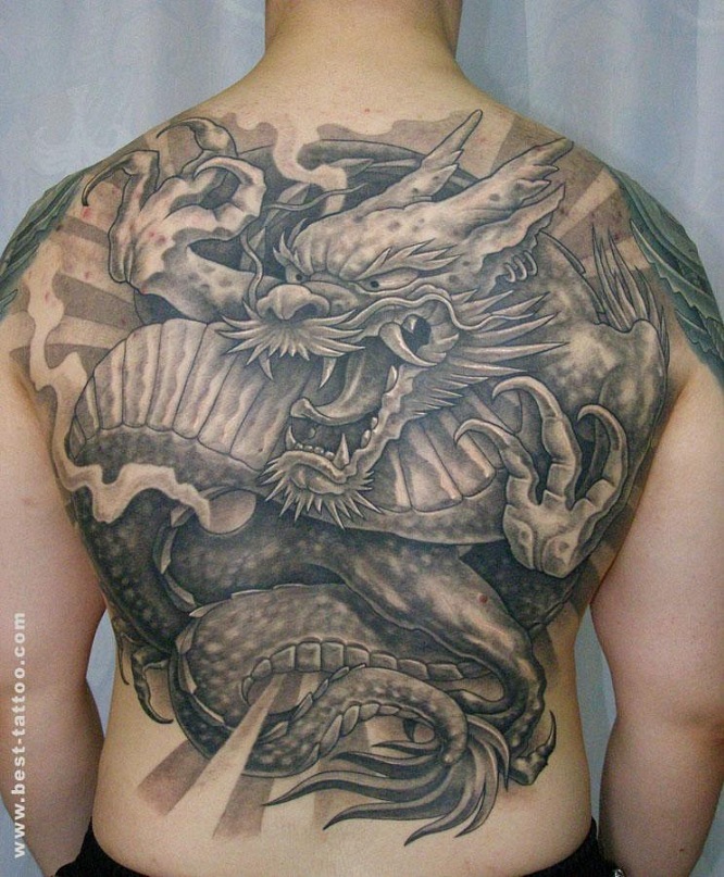 Black Ink Japanese Dragon Tattoo On Man Full Back