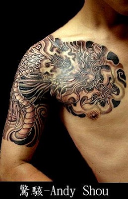 Black Ink Japanese Dragon Tattoo On Man Right Shoulder And Chest