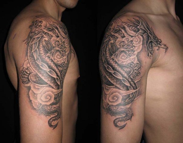 Black Ink Japanese Dragon Tattoo On Man Right Shoulder