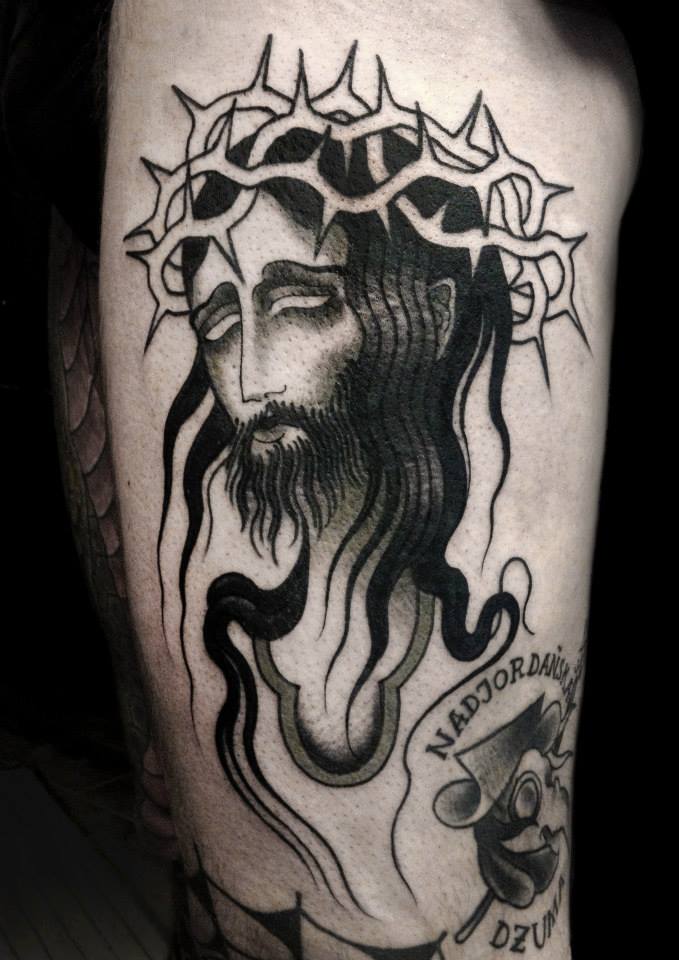 Black Ink Jesus Head Tattoo On Half Sleeve