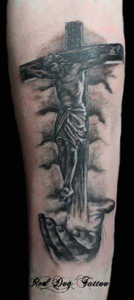 Black Ink Jesus On Cross Tattoo On Forearm