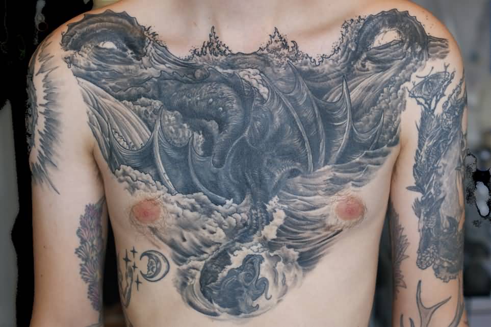 Black Ink Leviathan Tattoo On Man Chest