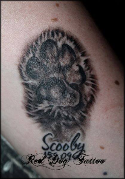 Black Ink Paw Print Tattoo Design For Sleeve