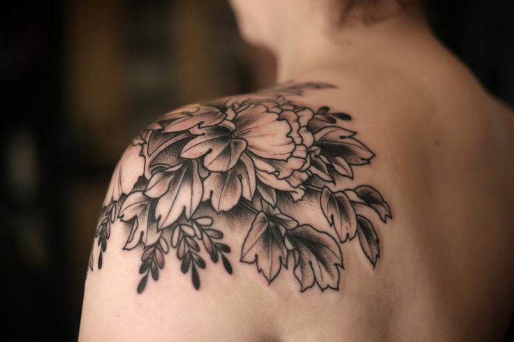 Black Ink Peony Flower Tattoo On Left Shoulder