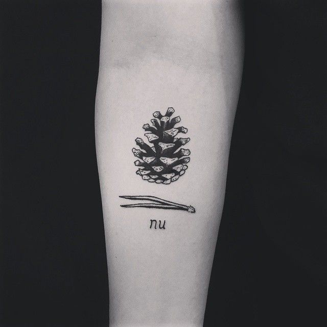 Black Ink Pine Cone Tattoo On Forearm